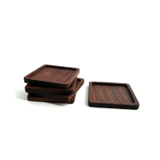 Aluslautaset korkista, pelastaa pöytäsi palojäljiltä