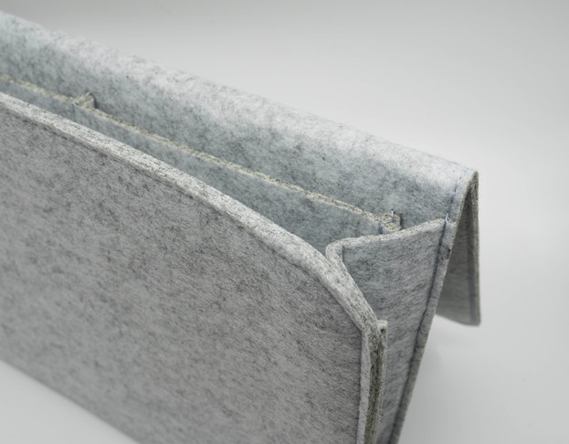 Storage bag, laptop bag in felt material for bedroom.
